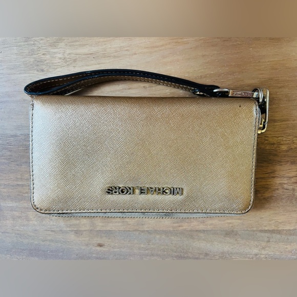 Michael Kors Handbags - Michael Kors Gold Wristlet with Black Strap